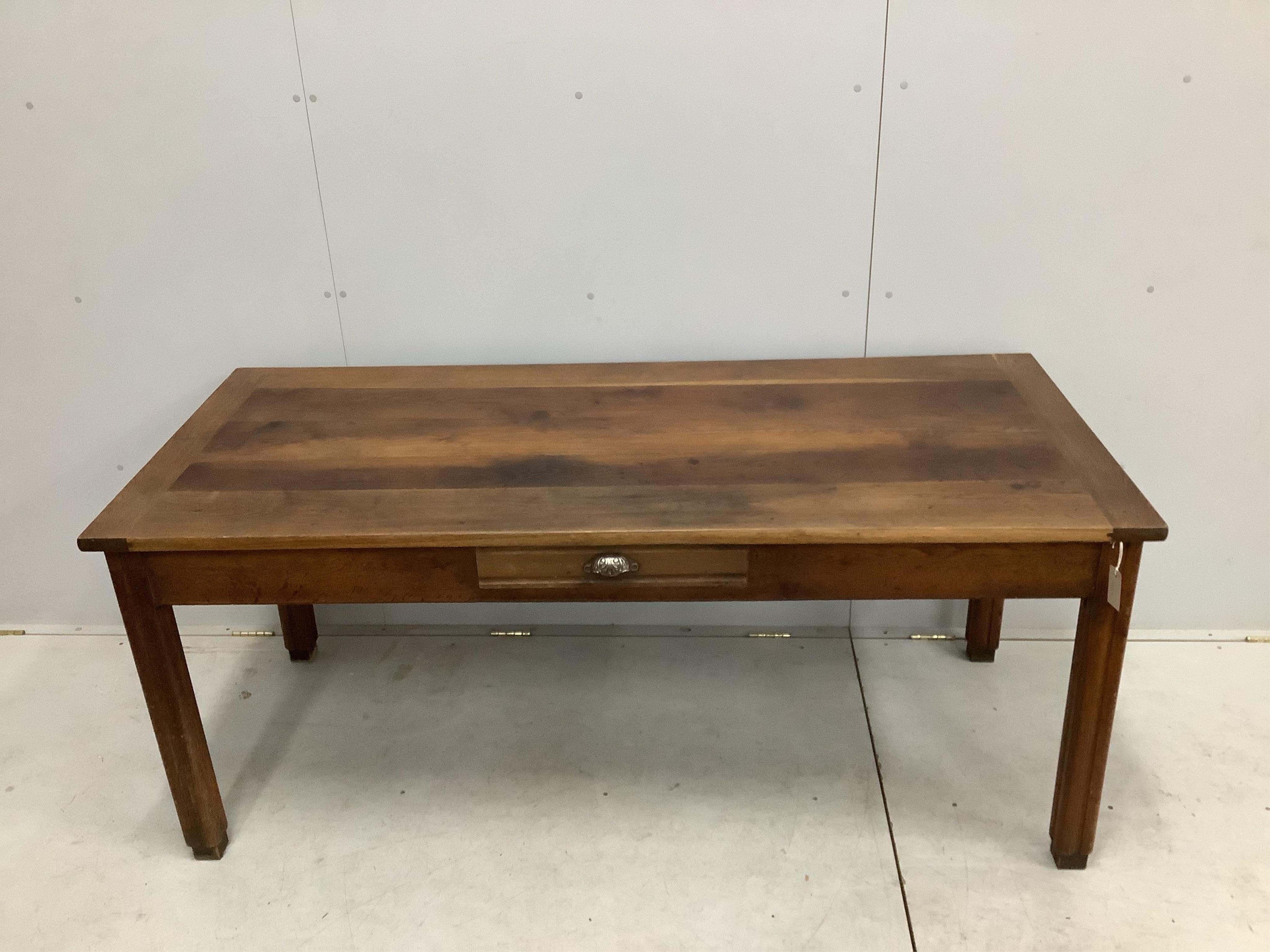 A French rectangular oak farmhouse kitchen table with detachable extension leaves and a single drawer, width 179cm, 277cm extended, depth 79cm, height 77cm. Condition - fair to good